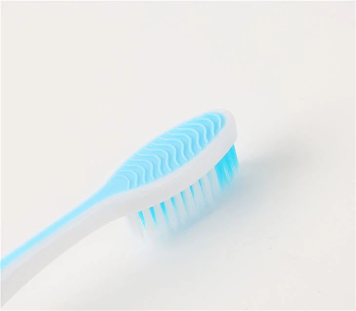 Rubber Handle Nylon Soft Toothbrush with tongue cleaner